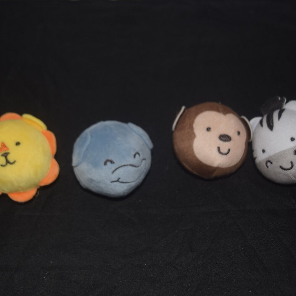 Melissa & Doug Rollables Safari Friends- set of 4 sensory plush toys for babies